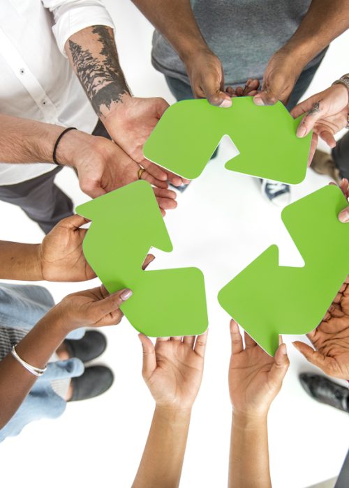 Group of People Holding Recycling Sign Concept